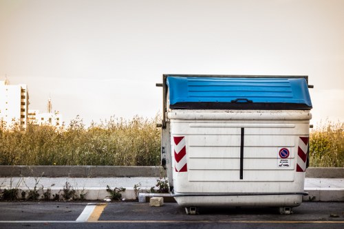 Residents arranging furniture for disposal in Waterloo